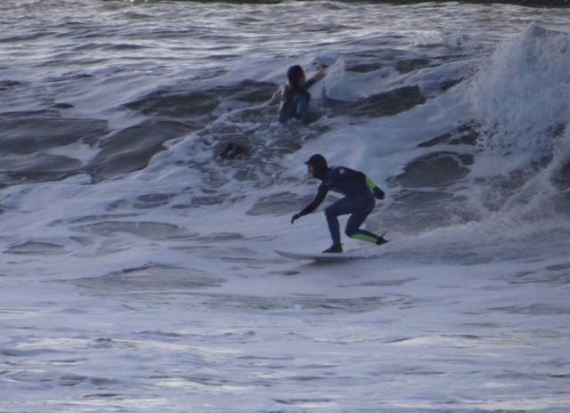  Surfer with winter wetsuit 